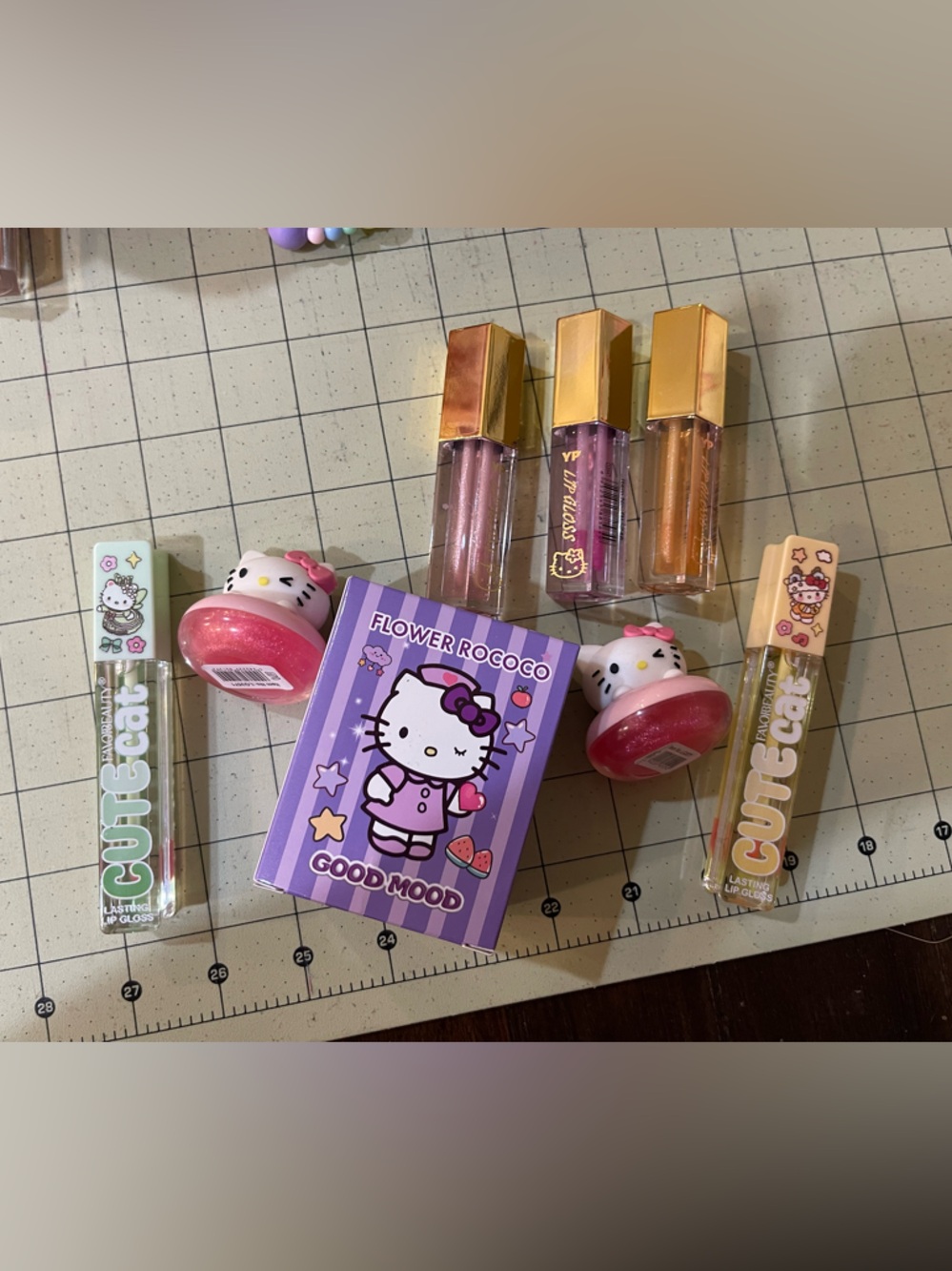 Hello Kitty themed Lip Gloss, balm, perfume in Pink, Purple, Gold - Picture 3 of 3